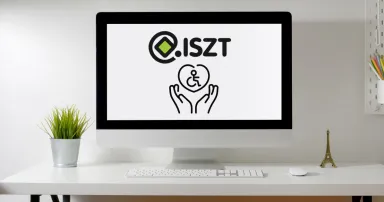 Monitor rajta ISZT logo alatt egy szív ikon benne egy mozgássérült embert szimbolizáló ikonnal
